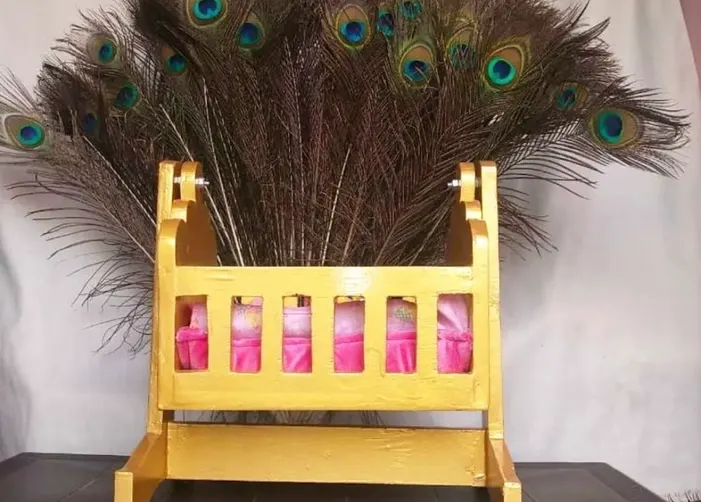 Designer Wooden palana  for laddu ji Golden colour polishing