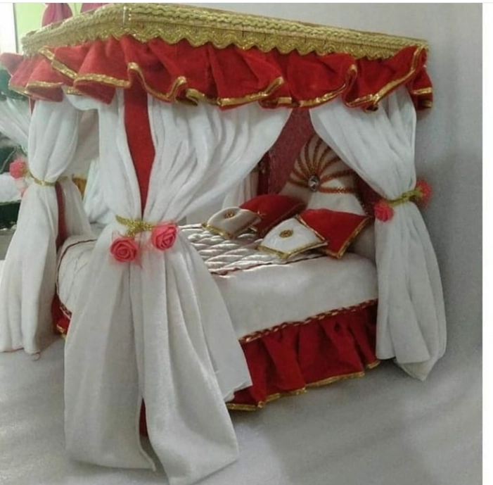 Yellow and white colour wooden bed