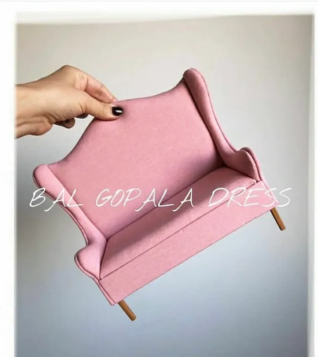 Red wooden sofa for laddu ji