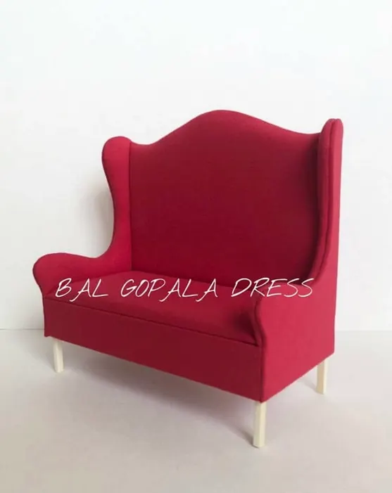 Red wooden sofa for laddu ji